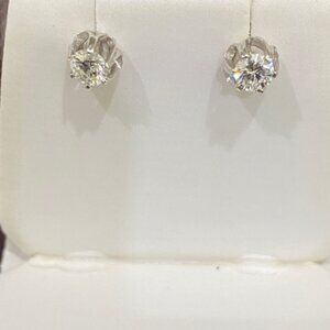 PAIR OF DIAMOND STUD EARRINGS SET IN 14KT WHITE GOLD -.25 CARATS ea. W/APPRAISAL